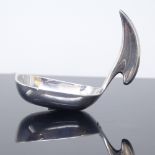 HANS HANSEN - a Danish sterling silver Viking Revival modernist caddy spoon, vertical stylised