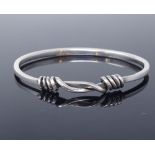 A Danish unmarked silver slave bangle, interwoven wirework design, internal diameter 65mm, 23.7g