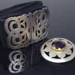 A Scandinavian unmarked silver Viking Revival belt buckle, and a Scottish silver plated amethyst