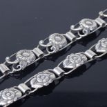 C BRUMBERG HANSEN - an Art Nouveau Danish silver Daisy panel bracelet, maker's marks CBH, bracelet