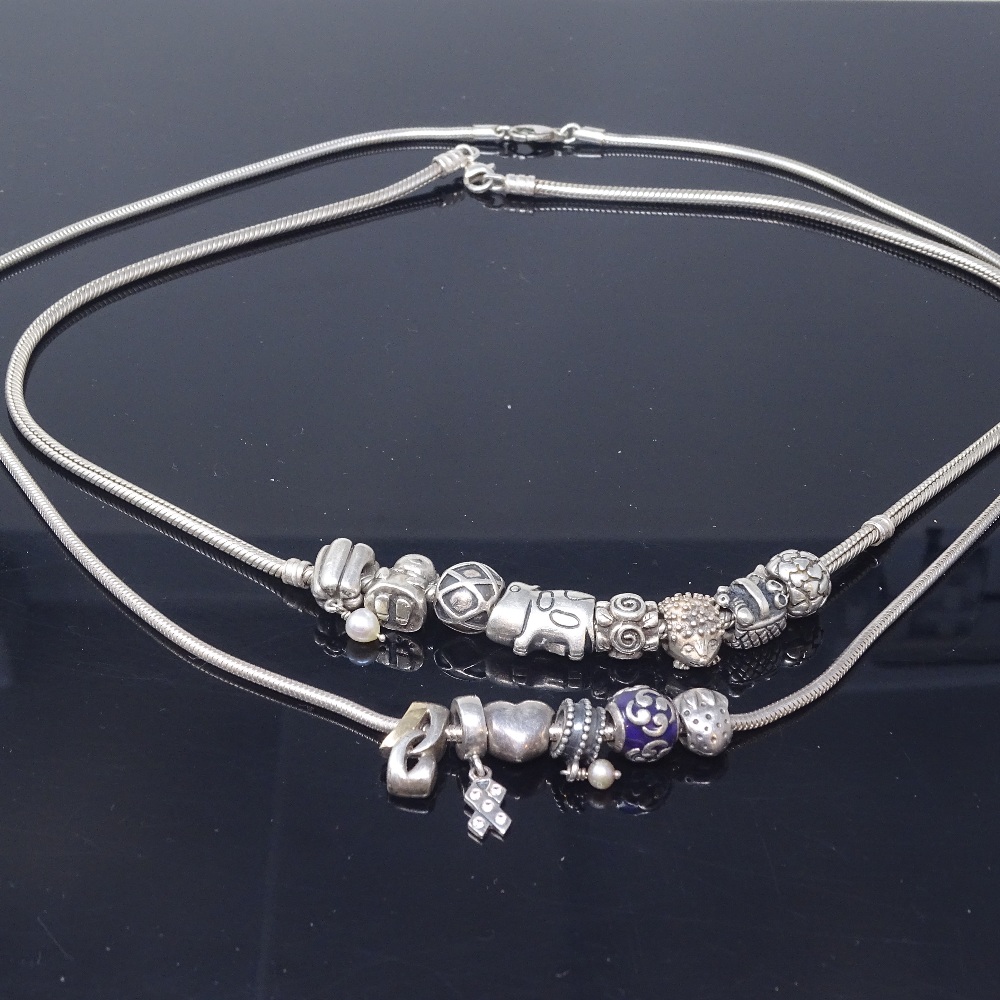 14 Pandora silver charms, on 2 unnamed sterling silver snake-link necklaces, necklace lengths 50cm - Image 2 of 5