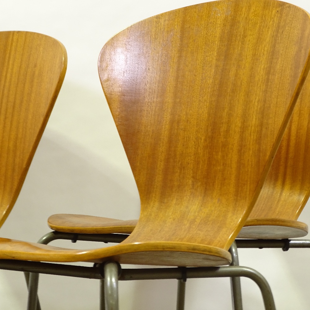 A set of 4 Mid-Century Danish bent plywood dining chairs, circa 1950s, shaped seats with steel legs, - Image 2 of 5