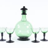 KOSTA BODA - a Mid-Century Swedish green glass liqueur set, comprising 1 decanter with stopper and 4