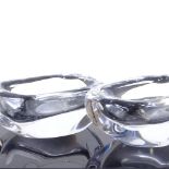 VICKE LINDSTRAND FOR ORREFORS - a graduated pair of Mid-Century Swedish clear Art Glass bowls,