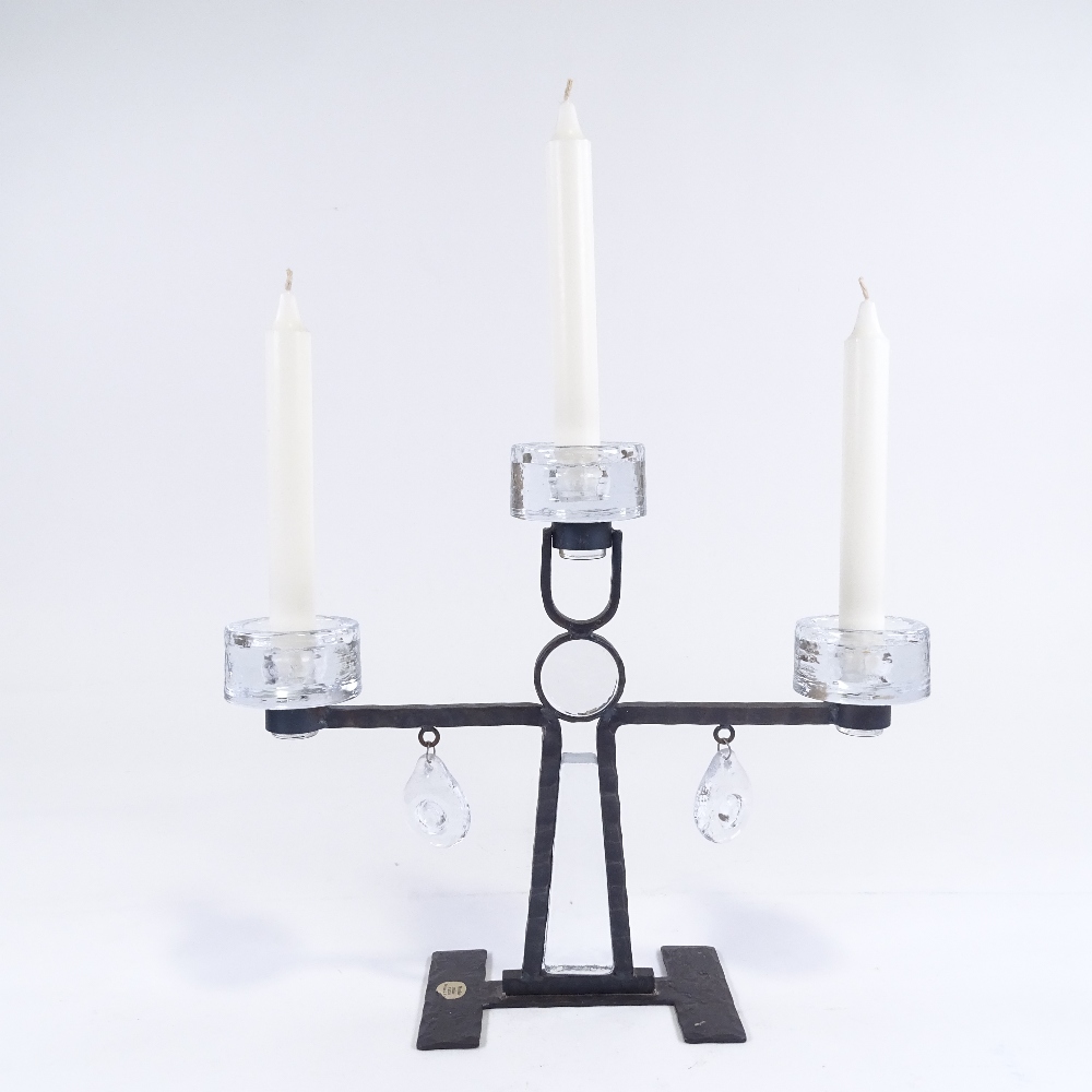 A Mid-Century Swedish cast-iron and clear glass 3-light candelabra, glass inserts and drops with