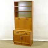 G-PLAN - a Vintage Retro Fresco Range teak cocktail cabinet / bookcase, circa 1970s, central fall-