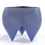 DEANA MOORE (British) - a Studio Pottery earthenware tripod pot, blue glaze, impressed maker's marks