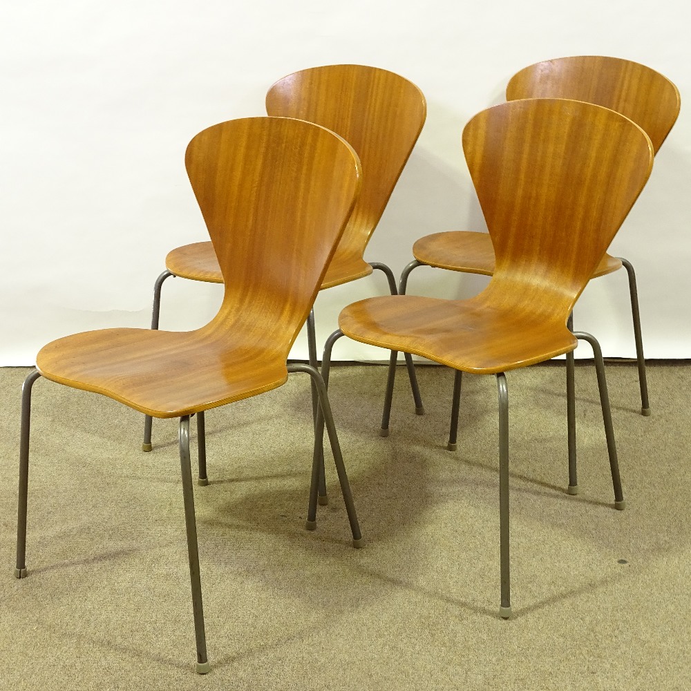 A set of 4 Mid-Century Danish bent plywood dining chairs, circa 1950s, shaped seats with steel legs,