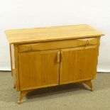 ANDREW J MILNE FOR HEAL'S - a Mid-Century Yugoslavian beech sideboard, circa 1952, frieze drawer