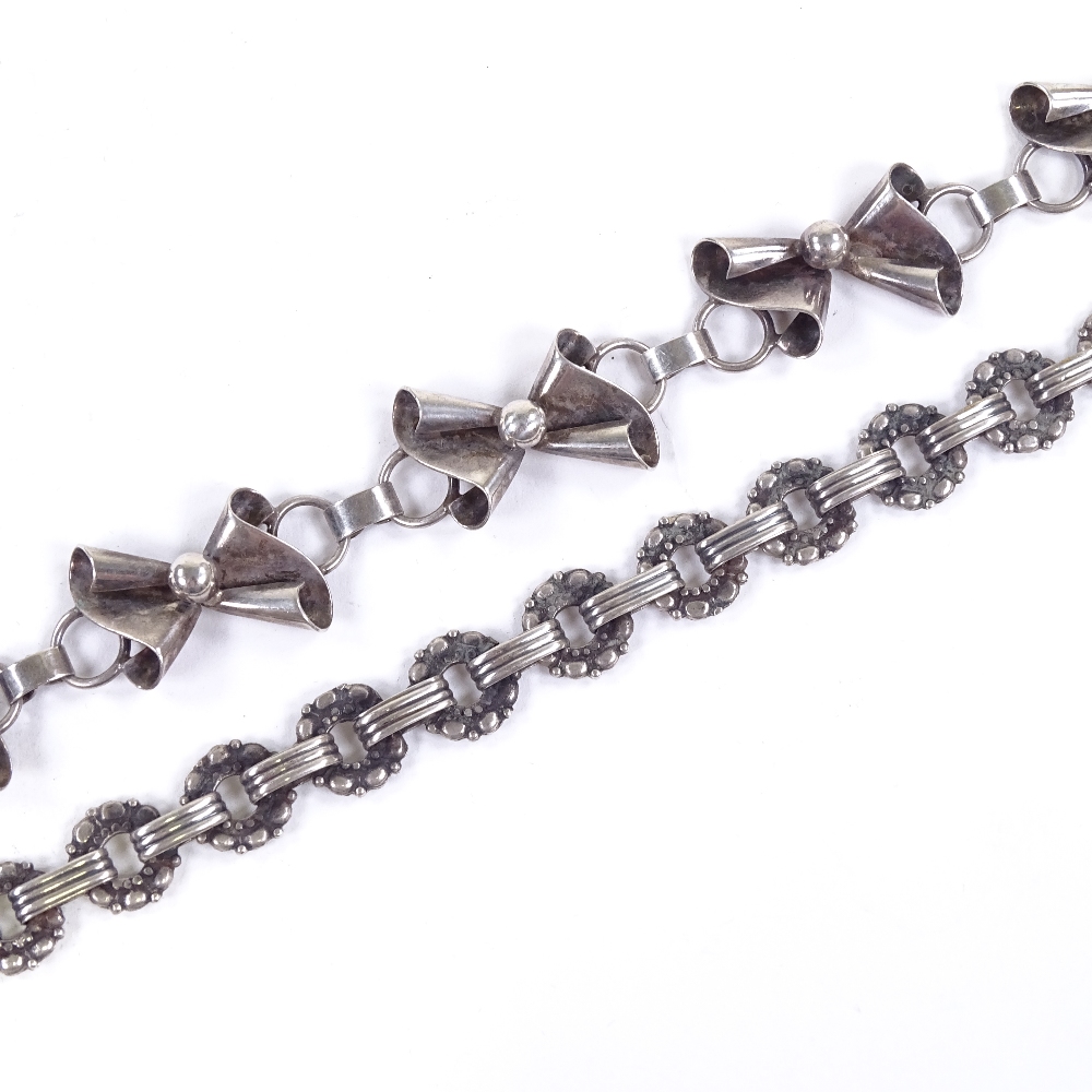 JOHN LAURITZEN - a Mid-Century Danish modernist silver bow panel bracelet, length 19cm, and a