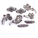 HERMANN SIERSBOL - 8 Vintage Danish stylised silver floral brooches, maker's marks HS, largest