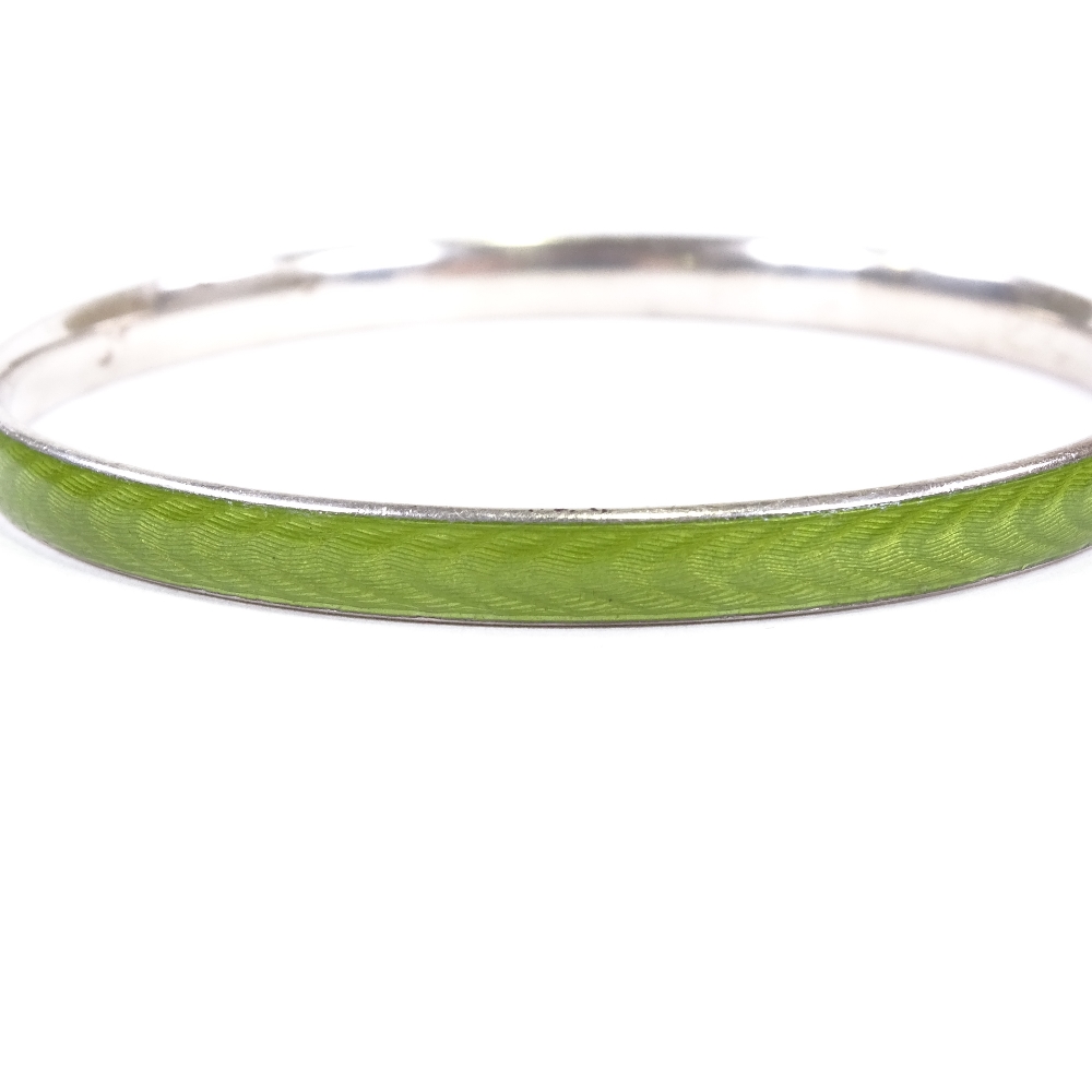 A Danish sterling silver and green enamel slave bangle, maker's mark HEF ?, band width 5.8mm,