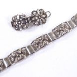 KAJ GEORG LENDAHL - a Danish stylised silver floral panel bracelet, length 18.5cm, and CARL M COHR -