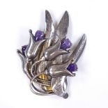 A large Danish stylised unmarked white metal and cabochon amethyst floral spray brooch, brooch