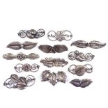 13 Scandinavian stylised silver and white metal floral brooches, makers include Hermann Siersbol,