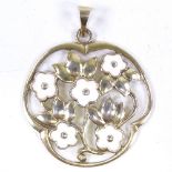 A Danish stylised vermeil sterling silver and white enamel Daisy pendant, no maker's marks,