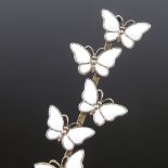 VOLMER BAHNER - a Vintage Danish vermeil sterling silver and white enamel 5-section butterfly bar