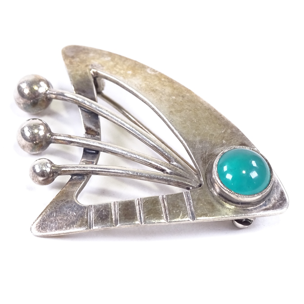 POUL HENRY HANSEN - a Vintage Danish silver and cabochon chrysoprase stylised Sputnik brooch,