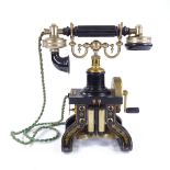 A 20th century reproduction telephone for the LM Ericsson Stockholm centenary 1976, cast-iron...