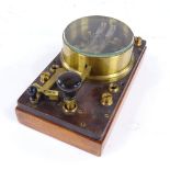 A GPO double current telegraph key with glass cover, on vulcanite and wood base, length 8.5"