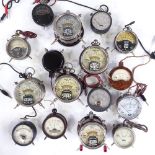 A group of volt meters, some with bakelite cases