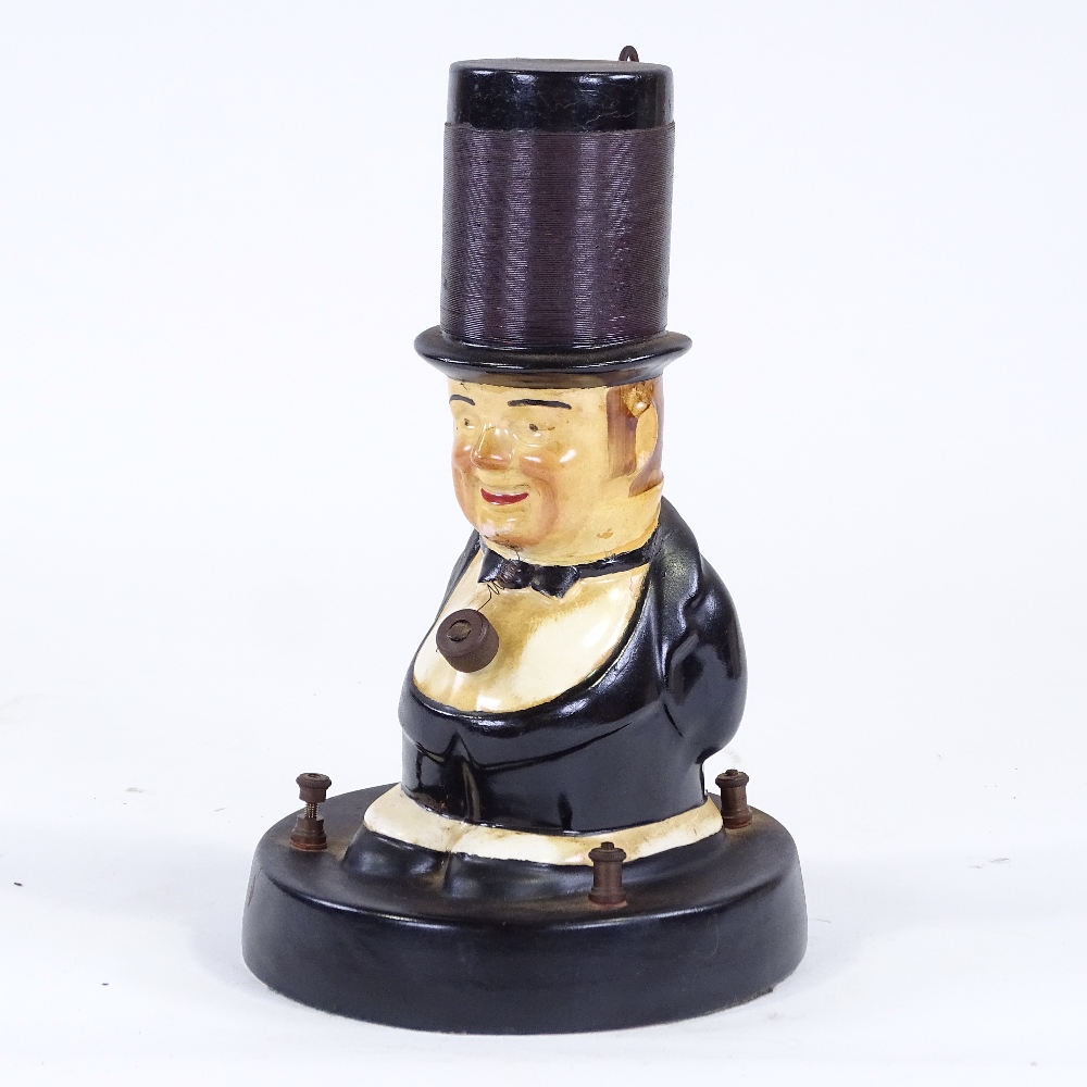 An Uncle Tom Grafton china crystal set radio, coil wound top hat and crystal holder shirt stud, 1924