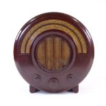 An EKCO model AD65 wood-effect Bakelite radio, 1934 design, by Wells Coates for E K Cole Ltd,