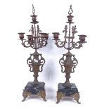 A pair of 19th century spelter 4-branch candelabra on marble bases, height 53cm