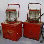 A pair of battery operated warning lamps