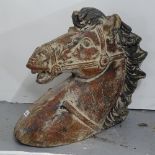 A painted composite horse-head sculpture, H46cm
