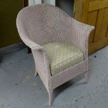 A painted Lloyd Loom bedroom chair