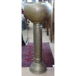 A brass jardiniere stand, with allover engraved decoration, H100cm