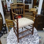 An Antique ash bow-arm chair