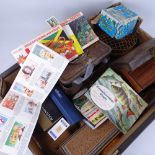 An Indian carved wood box, AA car badge, albums of tea cards etc (boxful)