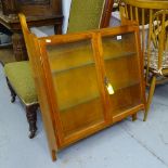 A teak hanging display cabinet, with 2 glazed doors, W76cm