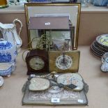 A copper and brass desk lamp, engravings, a clock, a dressing table set etc