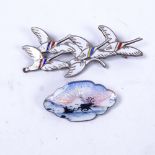 ERIK MAGNUSSEN - a sterling silver and "eneret" brooch, and another, and a silver and enamel