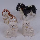 A Royal Crown Derby Cavalier King Charles Spaniel (gold button), a Beswick King Charles Spaniel, and