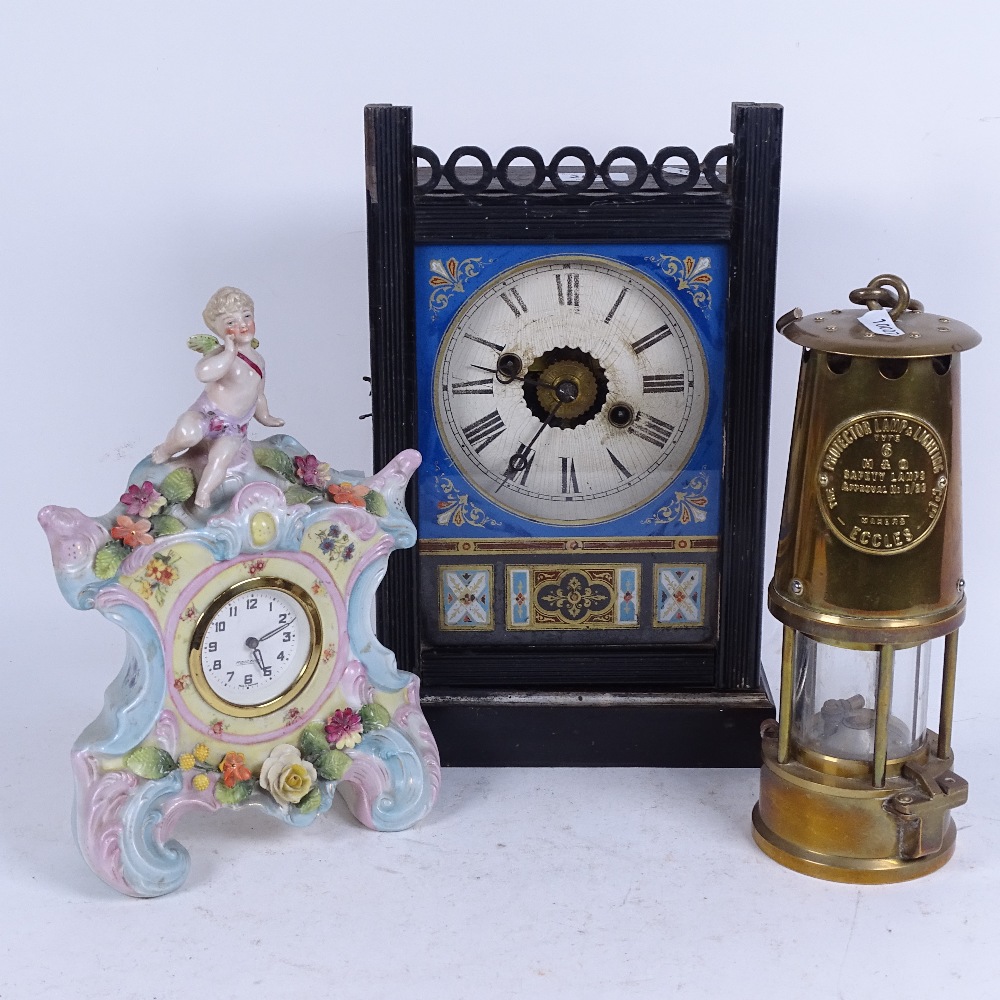 A small 19th century stained wood-cased kitchen clock, with Vernis Martin painted and gilded glass