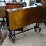 A Victorian walnut Sutherland table, on quadruple turned legs, W91cm, H73cm