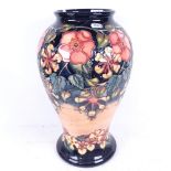A large Moorcroft Pottery vase (A/F), height 41cm