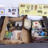 A box of postcards and tea cards etc