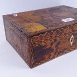 An Anglo-Indian tortoiseshell veneered box, with decorative fitted interior, length 29cm