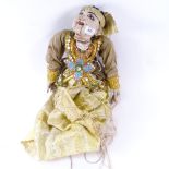 An Oriental hand painted and carved wood dancer puppet
