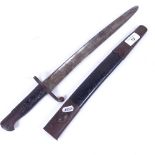 A British military sword bayonet, circa 1900, original brass-mounted leather scabbard, blade