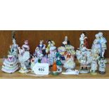 A collection of miniature ceramic figures, some with maker's stamps, largest height 9cm