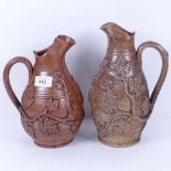 2 salt glaze stoneware pottery jugs, relief grapevine and figural decoration, largest height 26cm (