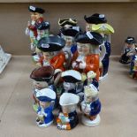 A collection of Victorian character jugs, tallest 28cm, 2 Toby desk sanders etc