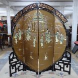 An ornate black lacquered Oriental 4-fold screen, with painted gilded and applied decoration,