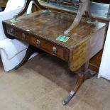 A Regency mahogany sofa table, with 2 frieze drawers having lion mask ring handles, on splayed legs,